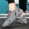 Zapatos casuales de punto volador para hombre, zapatillas deportivas transpirables y ligeras, zapatos transfronterizos para hombre al por mayor, zapatos de tela versátiles, envío directo de una sola pieza