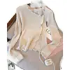 200.000 piezas vendidas: Suéter de punto irregular para mujer, diseño elegante, top de capa base, estilo puro y seductor