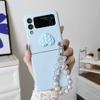Adecuado para Samsung Zflip 30% de descuento Apilado Sensación de piel Corazón Acolchado Zflip4 Oso de Dibujos Animados Cadena Colgante Funda Protectora para Teléfono Móvil