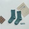 Z262 calcetines para niños al por mayor solo un otoño e invierno color sólido calcetines de tubo gruesos cálidos para niños y niñas calcetines para niños Algodón
