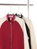 Nueva chaqueta de béisbol color block con cuello alto y cremallera, estilo pareja unisex, sudadera moderna y versátil, otoño temprano 2026