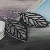 Recolección Transfronteriza de Pendientes Metálicos con Hojas Geométricas Escarchadas, Ganchos para Orejas Creativos Personalizados con Borla de Hoja Redonda Hueca