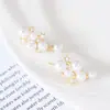 Pendientes Perla Nebulosa Brillante Aguja de Plata de Ley 925 Pendientes Elegantes de Alta Calidad Lujo Ligero Nicho Celebridad Pendientes de Verano