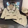 Conjunto de Punto para Niñas Otoño Invierno 2026 Nueva Chaqueta con Lazo Falda Estilo Pequeño Chanel Conjunto de Dos Piezas Venta Cruzada Dropshipping
