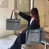 Tienda de Ropa Bolsas de Mano No Tejidas para Ropa de Mujer Empaque de Regalo Correas de Mano con Asa al Hombro Bolsas de Compras al por Mayor