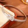 Pulsera de Cobre Chapada en Oro con Circonio, Diseño de Moda Tendencia Joyería para Pareja para Mujeres, Pulsera de Nudo de Vida y Muerte con Diseño Personalizado Venta al por Mayor
