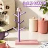 Portavasos de té para el hogar con forma de personaje lindo y encantador, estante de lujo de alta gama para tazas, estante de almacenamiento de escritorio, madera maciza