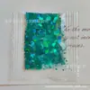 Suministro Directo de Fábrica Bolsa de 1g Lentejuela Láser Brillo Arte de Uñas Hecho a Mano DIY Barro de Cristal Slime Relleno de Polvo Brillante