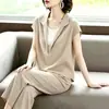 Traje casual de moda para mujer, nuevo estilo verano 2026, moderno, corte holgado, adelgazante, imitación dos piezas, manga corta, pantalón de pierna ancha, conjunto de dos piezas
