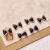 Acessórios de Nail Art Laço Estilo Chanel Tendência Laços Pequenos Decorações de Unha de Resina Atacado