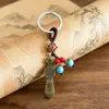 Estilo étnico chino joyería aleación espada de siete estrellas decoración pequeño regalo llavero colgante adorno colgante accesorios metálicos venta al por mayor