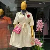 Ropa Femenina Transfronteriza Europea y Americana Moda Nueva Verano 2026 Elegante Vestido Amarillo Rayado con Mangas Abullonadas y Cintura de Corbata