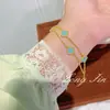 Nuevo Pulsera de Cuatro Hojas de Doble Capa Rosa Nácar Cadena Doble de Alta Gama Nicho Pulsera de Flor de Cuatro Hojas Mayoreo