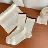 Calcetines Finos Blancos y Negros de Primavera Coreanos para Mujer Ins de Moda Calcetines Huecos de Talla Media Calcetines Lindo Florales Apilados en el Lateral