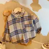 2026 Nueva Camisa Infantil de Otoño Vintage Estilo Coreano para Niños y Niñas Camisas de Cuello Campana Ropa Infantil de Moda Venta al por Mayor