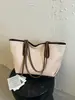 Bolsa de Axila Grande Capacidade Estilo Coreano Feminina 2026 Nova Moda Bolsa Tote Tecida Personalidade Tendência Simples Bolsa de Ombro