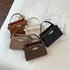 Diseño Personalizado Color Sólido Bolso de Mano para Mujer 2026 Verano Nuevo Retro Casual Estilo Coreano ins Bolso de Hombro Bolso Cruzado