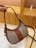 Moderna 2025 Nueva Versátil Bolso de Hombro Tipo Dumpling Moda Bolso Cruzado para Mujer con Estampado de Letras y Bloques de Color Bolso de Axila