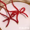 Moda europea y americana temperamento de nicho colgante explosivo cuentas de acero inoxidable hecho a mano cristal tallado rojo collar de lazo