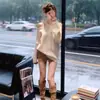Suprimento Transfronteiriço 2025 Novo Estilo Gola Halter Ombro Assimétrico Design Suéter Solto com Sensação Preguiçosa Roupa Externa Malha com Listras nas Axilas