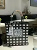 Mismo estilo en Tailandia Cesta Tejida de Repollo Hecha a Mano 2026 Nuevo Estilo Bolso de Playa Bolso de Regalo Bolso Cesta