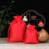 Bolsa de embalaje pequeña de brocado para la suerte al por mayor de fábrica bolsa de tela roja Bolsa de regalo antigua bolsa de la suerte con logo impreso