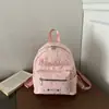 Mochila escolar para mujer estilo coreano transfronteriza, modelo nuevo 2026, simple y versátil, mochila ligera para ir al trabajo, uso casual y viajes
