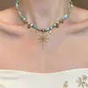 Collar de borla con cuentas florales azules de alta gama para mujer, un choker único para superponer, cadena para la clavícula chic y versátil