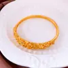 Moda Europea y Americana Pulsera Abierta Hueca Redonda Dorada Simple Versátil Pulsera de Gama Alta Joyería de Mano Personalizada de Moda para Mujeres