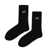 Calcetines de moda para hombre, de media pantorrilla, con letras, desodorantes, informales, deportivos, para otoño e invierno.