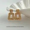 Pendientes geométricos cuadrados huecos con incrustaciones de circonita, sencillos y elegantes para mujer, con un toque de alta gama, versátiles para ir al trabajo y diseño único.