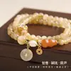 Pulsera Multicapa de Cristal Amarillo de Buena Fortuna para Mujer 2026 Nueva Pulsera de Perlas Lujo Ligero Nicho Accesorio Propicio