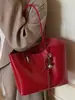 Bolso bandolera simple de gran capacidad para el día a día, nuevo modelo principios de otoño 2026, bolso tote de color liso único y dulce, bolso de hombro elegante