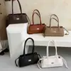 Bolso acolchado tipo Chanel para debajo del brazo, nuevo y moderno de la colección primavera-verano 2026, bolso baguette de alta gama vintage, bolso de mano para hombro para mujer