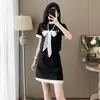 Conjunto de Vestido de Verão Estilo Francês 2026 para Mulheres, Emagrecedor e Unicamente Elegante, Lindo Top com Laço e Conjunto de Duas Peças com Saia Curta Casual