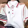Camiseta Bordada de Manga Corta con Botones y Solapa Talla Grande para Mujer Primavera y Verano 2025 Nuevo Top de Moda Holgado que Adelgaza y Cubre la Piel para Mujer