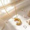 Diseño de nicho de luna cadena de clavícula de diamante creciente estilo europeo y americano collar de acero de titanio para mujer, collar de alta gama francés para mujer