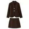 Ropa de Mujer Transfronteriza Primavera y Otoño 2026 Conjunto Europeo y Americano de Top Tipo Capullo con Hebilla Metálica y Chaqueta Color Block + Falda Corta para Mujer D17185