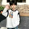 Camiseta de manga larga de algodón puro para niños, moda de primavera y otoño, capa base para niños, cuello redondo de dibujos animados, top holgado estampado versátil, camiseta moderna