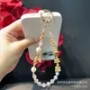 Cadena Creativa para Teléfono Móvil con Estilo de Texto Cadena Colgante con Cuentas de Cristal de Aleación Lanyard de Muñeca para Teléfono Móvil Rojo de Año Nuevo
