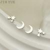 Pendientes de moda de estilo japonés y coreano con diseño de estrella y luna de nicho simple y versátiles de acero inoxidable con galvanoplastia y múltiples estrellas y lunas.