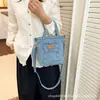 Bolso de mano informal de mezclilla estilo coreano para mujer, nuevo bolso cruzado de moda callejera retro de alta gama 2026