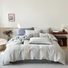 Nuevo Juego de Cuatro Piezas de Algodón Puro de Color Sólido Estilo Sencillo, Sábana y Funda de Edredón de Algodón Lavado Teñido en Hilo, Adecuado para Todas las Estaciones, Ropa de Cama al por Mayor