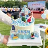 Decoración de Pastel para la Temporada de Graduación 2026: Gorra de Doctorado, Mochila Escolar, Figuras de Estudiantes Hombres y Mujeres, Velero de Navegación Fluida y Ola del Océano Topper