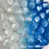 Urso Resinado com Cabeça de Gato e Patas de Gato que Mudam de Cor com Luz UV, Pulseira com Contas Espaçadoras para Celular, Acessórios para Corrente de Celular DIY Feita à Mão