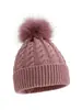 Nuevos estilos de otoño e invierno de gorros de punto trenzado para niños, disponibles en Amazon para ventas transfronterizas, en colores lisos con pompón, que brindan calidez y protección contra el viento.