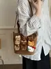 Bolso de Mano de Moda con Estampado de Leopardo Muñeco de Peluche Lindo de Dibujos Animados Bolso de Hombro Nuevo Estilo 2026 Bolso Cubo Lindo Personalizado