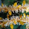Guirnalda de decoración navideña con hojas curvas, espumillón, cintas y tiras decorativas para decoraciones de fiestas navideñas y adornos colgantes