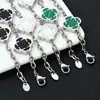 Pulsera Cruzada de Hip-Hop Europeo y Americano de Acero Inoxidable con Trébol de Cuatro Hojas para Mujer Cadena en Forma de O Joyería de Acero de Titanio Joyería de Diseño de Nicho Personalización de Joyería