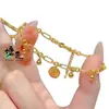 Tienda de Oro Mismo Estilo Color Dorado Pulsera Colgante de Fortuna para Mujeres Diseño de Nicho Bolitas Pequeñas de Oro Oro Arena Joyería de Alta Gama